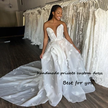 Elefántcsont Organza A Line esküvői ruhák Kedvesem 3D Virág Beach Menyasszonyi ruha vonattal Hosszú luxus menyasszonyi ruhák Csipke vissza
